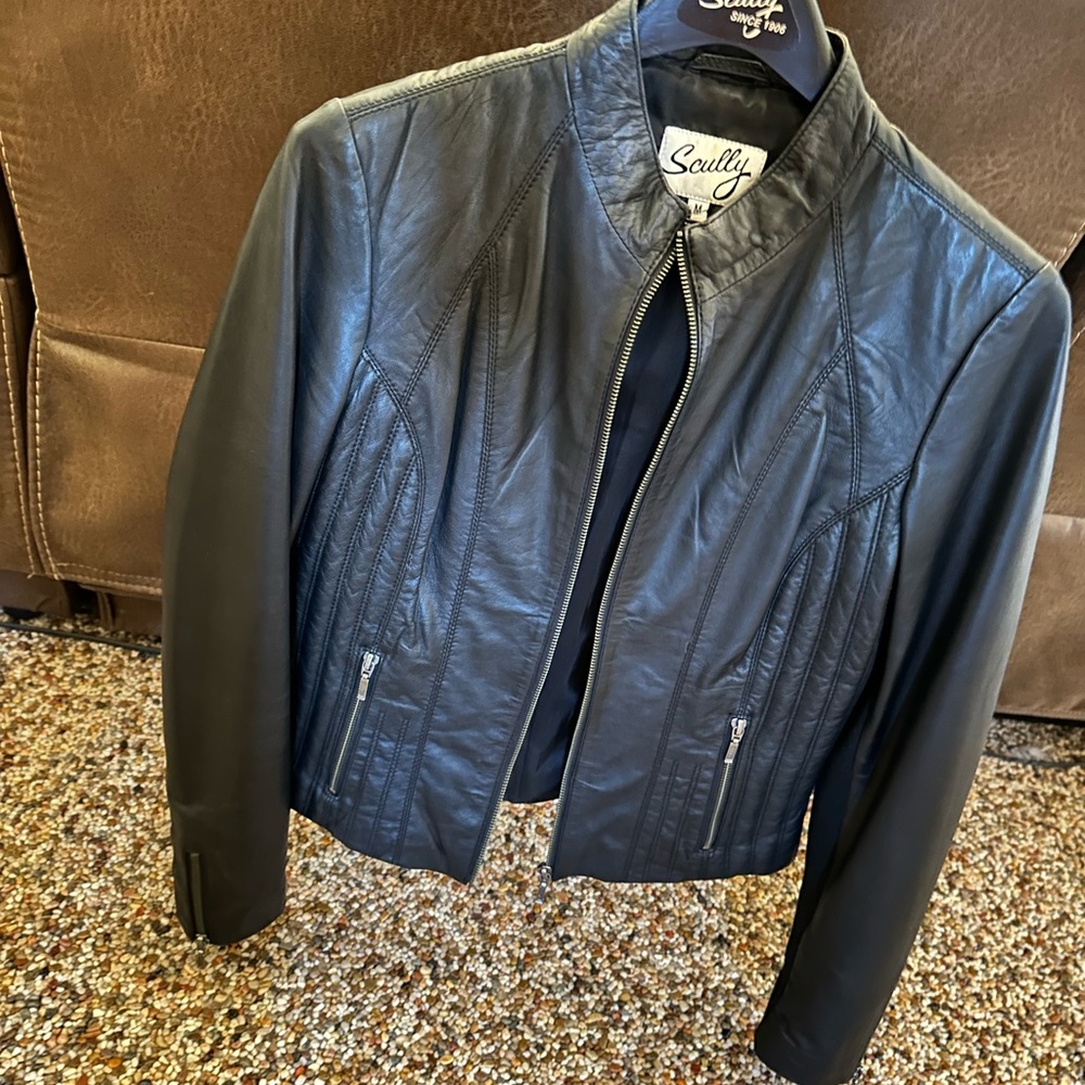 Very nice black leather jacket by Scully.Seriously you will not be disappointed.